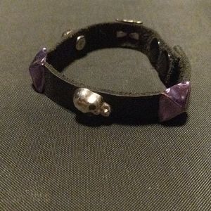 Small Leather bracelet w/ purple pyramids & skulls